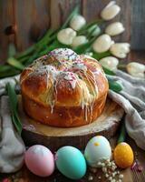 Traditional Easter Bread Decorated with Colorful Sprinkles and Eggs photo