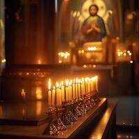 Serene Church Interior with Illuminated Candles and Religious Icon photo