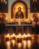 A serene atmosphere in a candlelit chapel with religious icons photo