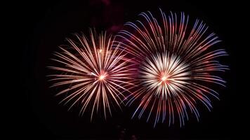 Vibrant fireworks lighting up the night sky in stunning colors photo
