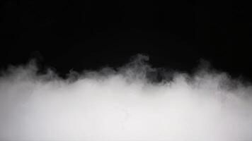 Mysterious Fog Swirling on a Dark Background photo