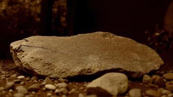 Natural Rock Formation Surrounded by Smaller Stones in Earthy Tones photo