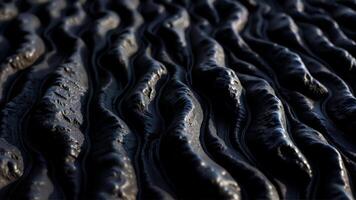 Textured Dark Surface with Flowing Patterns photo