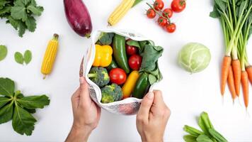 Fresh Organic Vegetables in a Reusable Bag for Healthy Eating photo