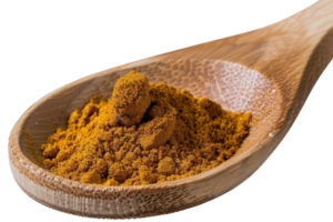 Close-Up of Yellow Spice Powder in Wooden Spoon on White Background for Culinary and Cooking Concepts png