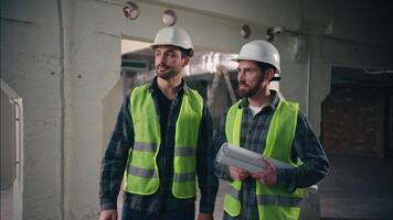 Friends colleagues Caucasian men greeting meeting support gesture hit with fists males guys construction builders contractors civil engineers build partners teamwork architects workers respect hands video