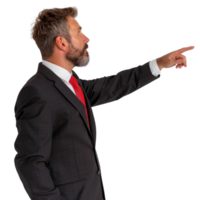 Businessman in Suit Pointing to the Side with a Focused Expression in a Studio Setting png