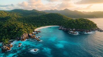 Aerial view of tropical island in the ocean with turquoise waters and green vegetation at sunset video
