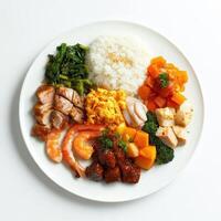 A colorful plate of assorted cooked foods served elegantly photo
