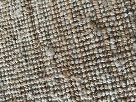 Texture of woven natural fibers on a surface in a cozy indoor setting photo
