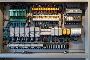 Electrical cabinet showing complex wiring and components for power distribution photo