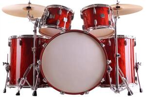 Red drum set isolated on white background waiting for drummer photo