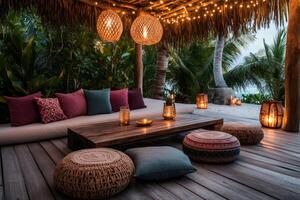 Cozy chill out lounge area illuminated by string lights and lanterns overlooking tropical beach photo