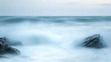 Abstract Seascape with Blurry Waves and Rocks photo