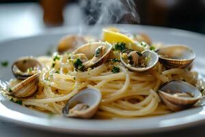 Steaming hot spaghetti with clams and lemon zest photo