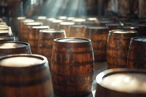 Wine or whiskey aging in oak barrels in cellar or winery warehouse photo