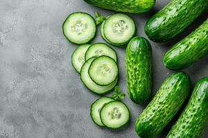 A vibrant display of fresh green cucumbers for national cucumber month photo