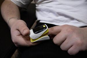 Pulse oximeter used to measure pulse rate and oxygen levels photo
