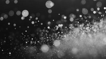 Abstract Grayscale Glittering Particle Burst on Dark Background photo