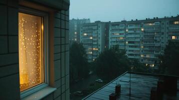 Rainy City Night View from Apartment Window photo