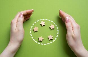 Hands guard the stars in the circle. Team members and organization members. Teamwork, unity, and organizational support. Collaboration, member protection, and collective responsibility photo