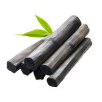 Bamboo charcoal sticks with green leaves arranged on a clean background for natural aesthetics, Bamboo charcoal isolated on transparent background png