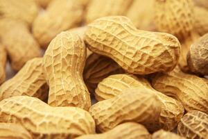 Peanut in a Shell Texture. Food Background of Peanuts photo