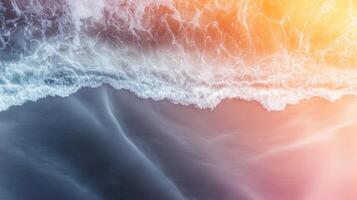 Colliding ocean waves create stunning patterns at sunset along the coastline photo