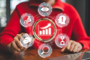 Conceptual image depicting growth with business icons and a rising graph, symbolizing success and progress in a digital context. photo