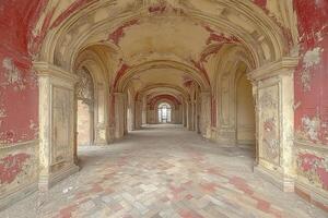 Decaying Hallway In Abandoned Building Showing Architectural Detail photo