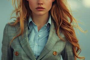 Close-up of a woman's face, hair, and jacket with buttons photo