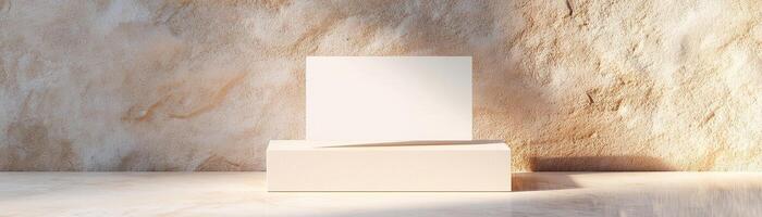 A blank business card stands upright, slightly leaning against a neutral-toned wall. The background is softly blurred, creating a refined atmosphere perfect for luxury branding photo