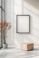 A well-lit gallery room features a large blank frame floating against a smooth white wall. The modern decor includes soft ambient lighting, inviting creative expressions photo