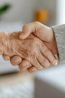 A caregiver gently holds the hand of an elderly individual, offering a warm smile in a bright and inviting home setting, creating a sense of comfort and trust photo