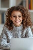 A smiling educator supports a student in an online session, fostering a positive atmosphere for learning. Books and materials softly blur in the background, enhancing focus on the interaction photo