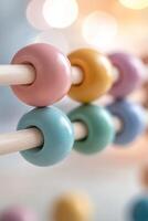 Bright, colorful counting beads on an abacus are prominently displayed, inviting young learners to engage in math activities. This setting reflects a supportive educational environment photo