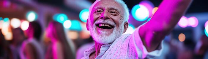 A joyful elderly man dances with a big smile, enjoying the lively atmosphere created by colorful disco lights. The soft-focus lighting enhances the vibrant energy around him photo
