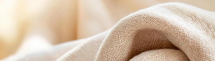 The soft, abstract footer showcases a woven linen fabric in warm beige tones. Its subtle texture and soft focus create an inviting background perfect for lifestyle and home decor promotions photo