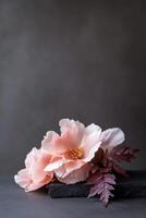 Soft light highlights the delicate textures of deep pink and red peonies arranged on a dark backdrop, creating depth and elegance ideal for upscale product promotion photo
