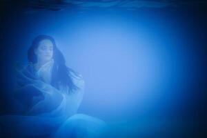 Underwater portrait of woman photo