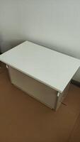 Installing modern furniture, white cabinet being assembled in prague apartment photo