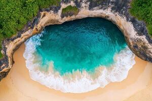Exploring nature hidden gem concept. Aerial view of a serene beach with turquoise water and rocky cliffs surrounded by lush greenery. photo
