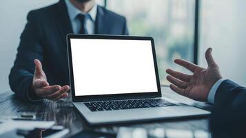 Teamwork and leadership with goal-setting concept. Business meeting with a laptop and two professionals discussing ideas. photo