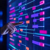A hand interacts with a vibrant digital interface displaying interconnected nodes and pathways, symbolizing data visualization or technology. photo
