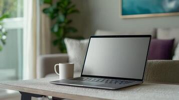 Business entrepreneurship with remote work concept. Workspace featuring a laptop on a table, accompanied by a coffee cup, in a cozy indoor setting with plants in the background. photo