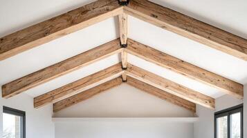 Home improvement with sustainable building concept. Wooden beams and a light-colored ceiling, creating an open and airy atmosphere. photo