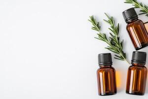 Health supplements and natural remedies concept. Essential oils with rosemary on a light background. photo