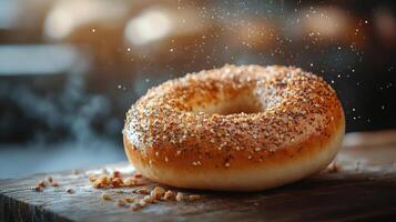 A toasted everything bagel with sesame seeds and poppy seeds. photo