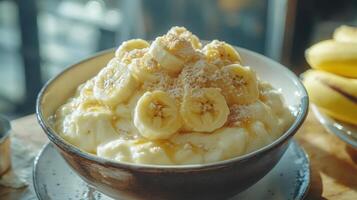 A bowl of banana pudding with sliced bananas on top photo