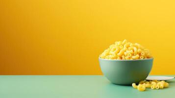 A bowl of macaroni with a spoon on the side photo